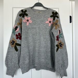 Beautiful Boutique Sweater. Size L. Gray with beautifully stitched flowers.